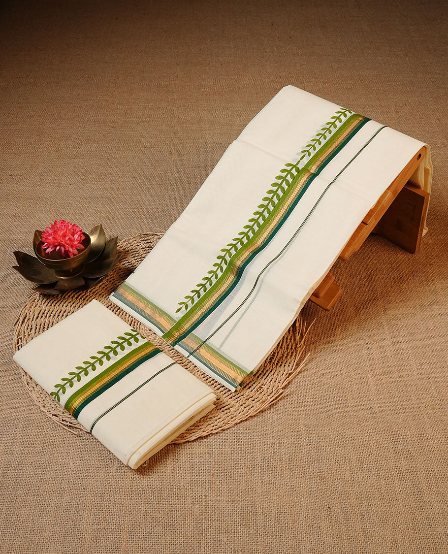 Off white colour Cotton Set Mund featuring a plain body, enhanced by a green leaf printed border with a gold zari stripe.