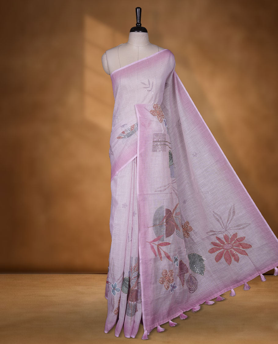 Light Pink colour linen saree featuring Pink colour fade border with floral beats pattern around floral print across body without border, pallu and matching blouse piece.