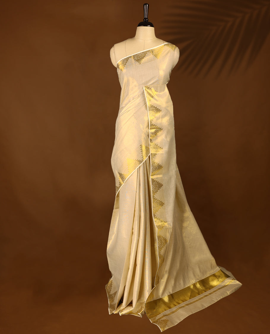 Gold colour Tissue Kerala saree featuring Plain body and a beautifully woven Gold Kasavu border with floral & Temple Motifs, paired with a matching blouse perfect for festive occasions.
