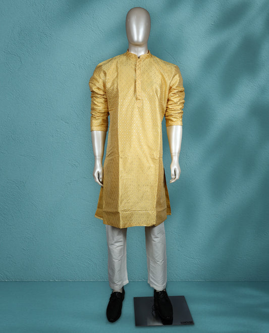 Yellow colour semi silk partywear kurta set featuring self colour thread and sequin work on the body, full sleeves, and paired with a matching bottom.