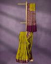 Bung Bean Colour Pure Banaras Soft Silk Saree adorned with traditional antique zari motifs, paired with a hand dyed Dark Maroon antique style border and a matching blouse.