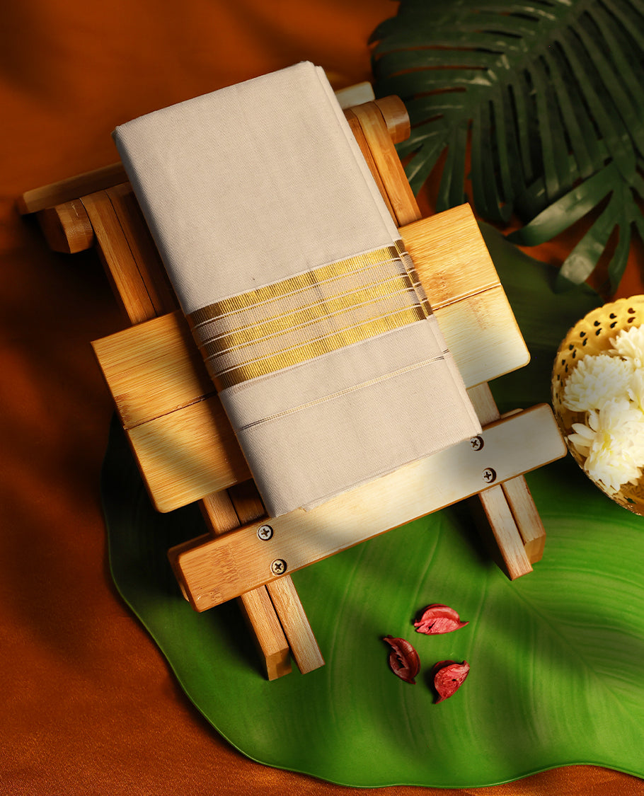 Light ivory Colour cotton double dhoti with 2 Inch Golden kara, crafted for traditional elegance & comfort, for men.