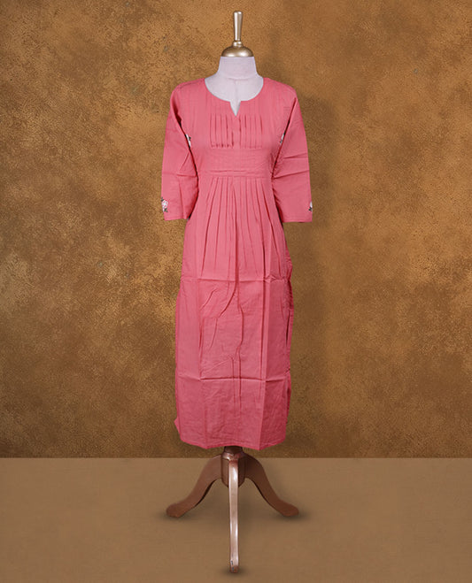 Pink colour kurti  styled with a floral thread pattern Round neckline, knee length design, styled with a Round neckline and a  sleeve .