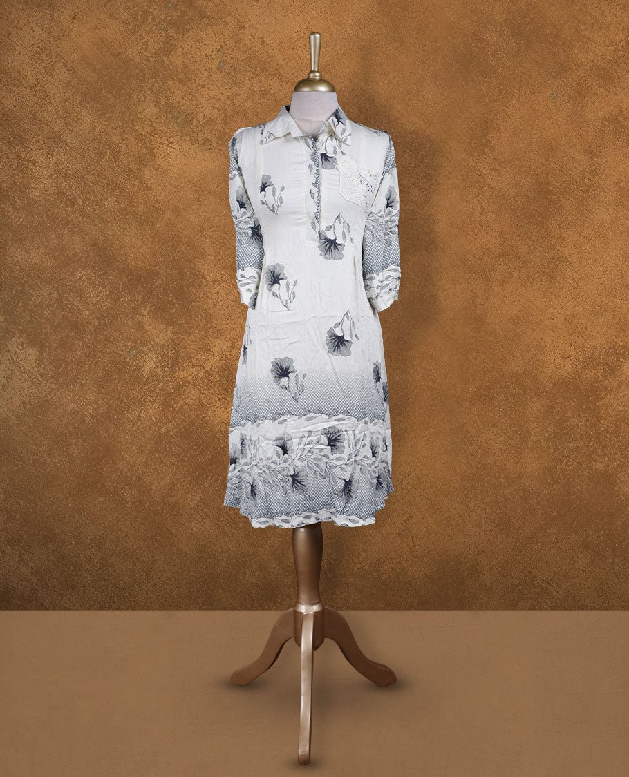 Ivory and grey floral printed shirt dress with collared neckline, half button placket, lace-appliqué detail on chest, three-quarter sleeves, and scalloped hemline