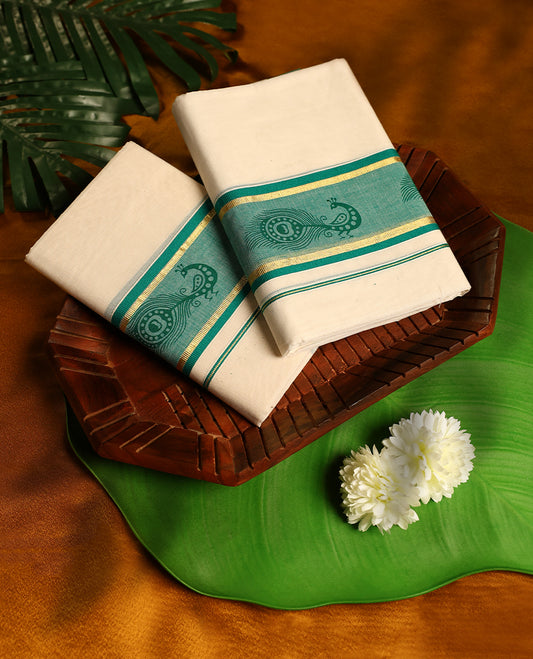 Off white colour cotton SET MUNDU featuring a plain body, complemented by green and gold toned border with peacock prints( 2.00/2.80 MTS).