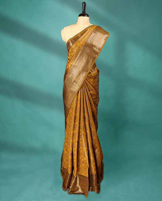 Mustard Art Soft Silk Saree showcases intricate silver zari work on the body and border, paired with a matching blouse