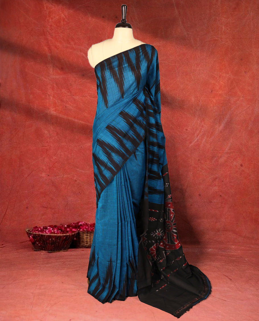 Blue and black colour Ikkat Pochampally saree featuring bold abstract ikkat patterns on the body, traditional geometric ikkat design on the pallu, without Blouse