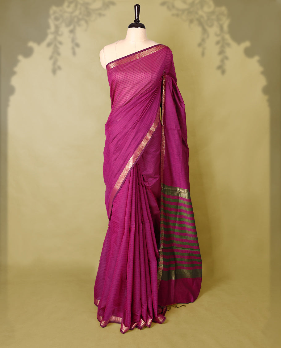 Deep Magenta colour chanderi cotton saree with fine striped body, mangalgiri border, grand pallu featuring Green and gold zari stripes, with matching blouse.