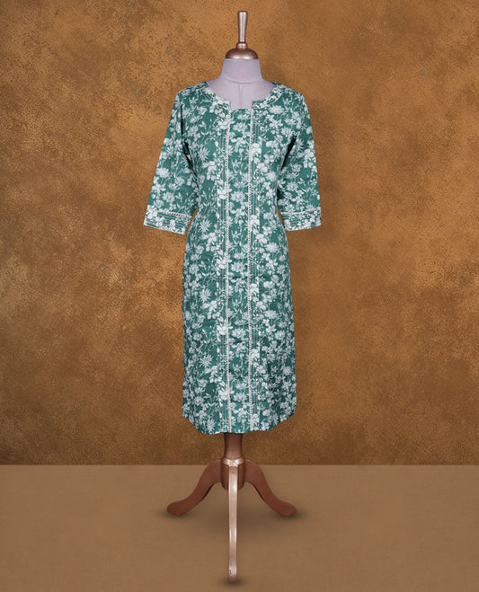 Teal green colour floral printed kurti by Talisha with round notch neckline, straight calf‑length silhouette, vertical pintuck detailing on the front, and three‑quarter sleeves with contrast printed cuffs.