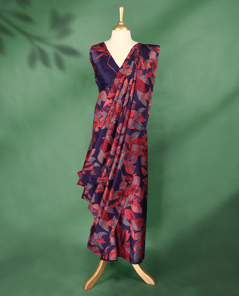 Deep purple colour Manipuri saree features a body with bold red and grey floral prints, a minimal border, and comes with a matching blouse.