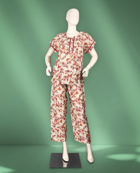 Cream colour floral women's nightwear set featuring a round neck with pleat detailing, short kimono sleeves, and relaxed-fit pants for ultimate comfort and elegance.
