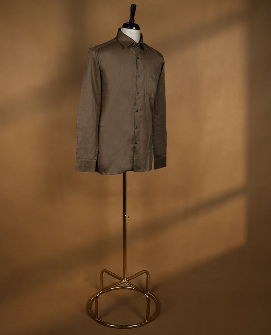 Dark brown colour OTTO men’s shirt in a relaxed formal fit featuring a subtle glossy texture with full sleeves, classic collar, and chest pocket perfect for elegant occasions