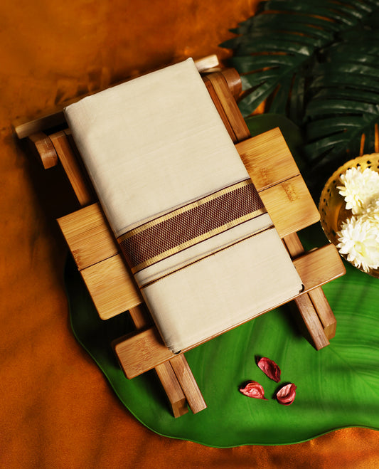 Elegant off white pure handloom cotton double dhoti featuring a rich maroon and golden zari border, showcasing traditional craftsmanship, ideal for weddings, festive occasions, and cultural celebrations.