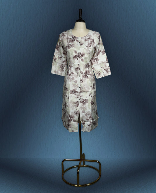 Off white kurti with an all over muted brown floral print, styled with a round neckline, front button down design, and three quarter sleeves