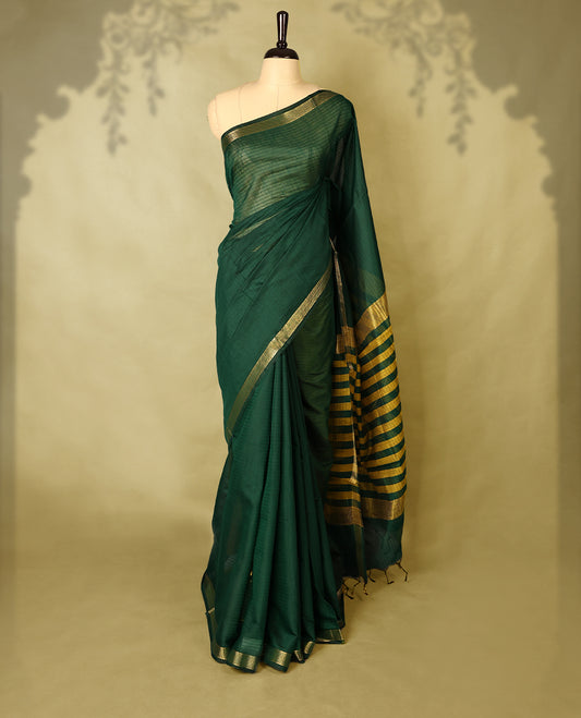 Bottle Green colour chanderi cotton saree with fine striped body, mangalgiri border, grand pallu featuring Mustard and gold zari stripes, with matching blouse.