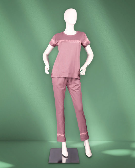 Dusty mauve colour nightwear featuring a round neckline, short sleeves with satin panel detailing, and straight-fit pants accented with matching satin trims at the cuffs.