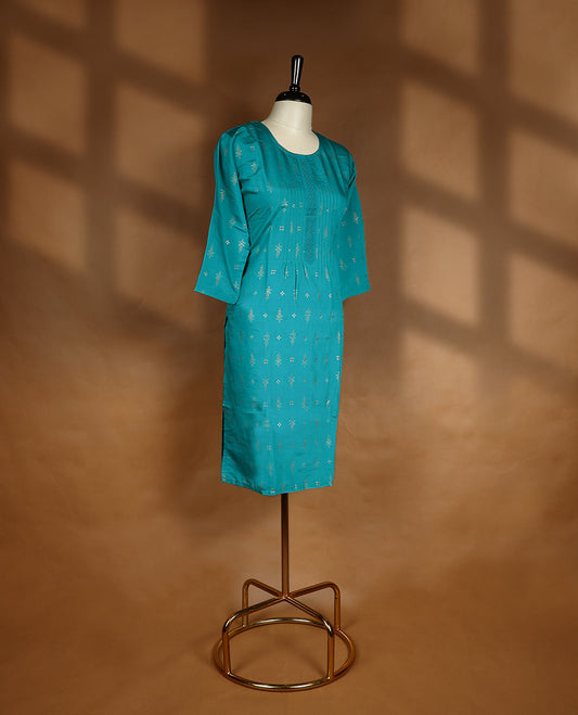 Dark aqua colour kurti from TWARA, featuring intricate golden foil print in a delicate pattern, finished with a round neckline.