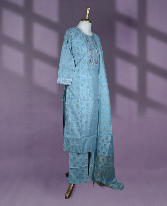 Sky blue colour kurti set features a round neck with delicate embroidery, three-quarter sleeves with subtle detailing, and is paired with matching pants and a tasseled dupatta for a graceful ethnic look.
