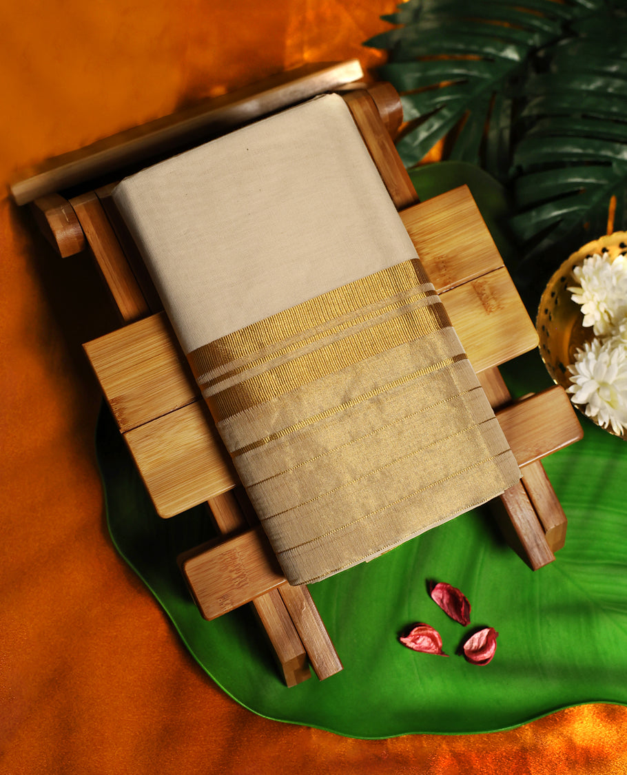 Elegant off white colour cotton double dhoti highlighted with a broad golden zari border, crafted for a royal traditional look, perfect for festive occasions and cultural ceremonies.
