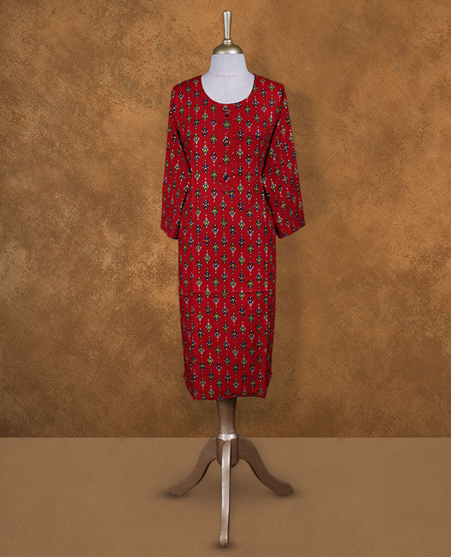 Red colour kurti styled with round neckline, multicolour pattern and gold dots on body and sleeve