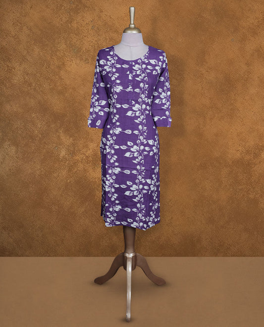 Violet colour kurti with White floral prints, knee length design, styled with a round neckline and a sleeve .