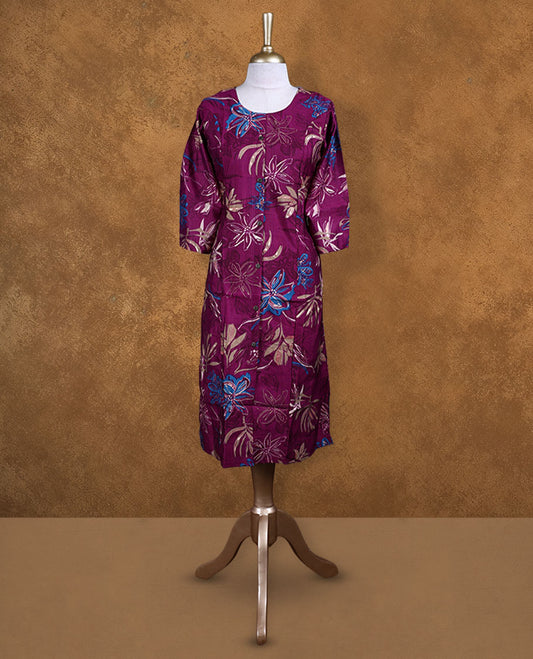Wine colour kurti splashed with bold floral prints in beige and blue, styled with a scoop neckline, front button detailing and comfy 3/4th sleeves.
