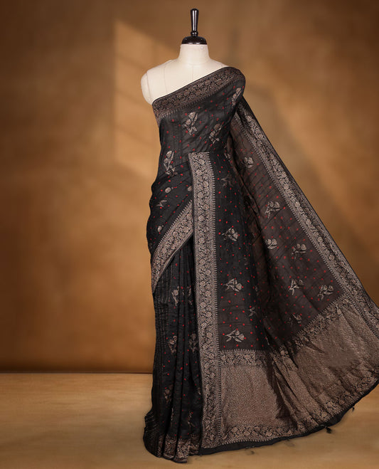 Black colour Banarasi Bandhani silk saree featuring with intricate Banarasi motifs on body, complemented by antique zari woven border and grand pallu, paired with matching  blouse