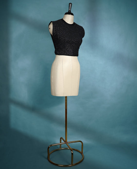 Black colour sleeveless crop top featuring a ribbed crew neck and all over stud embellishments, offering a chic and edgy look
