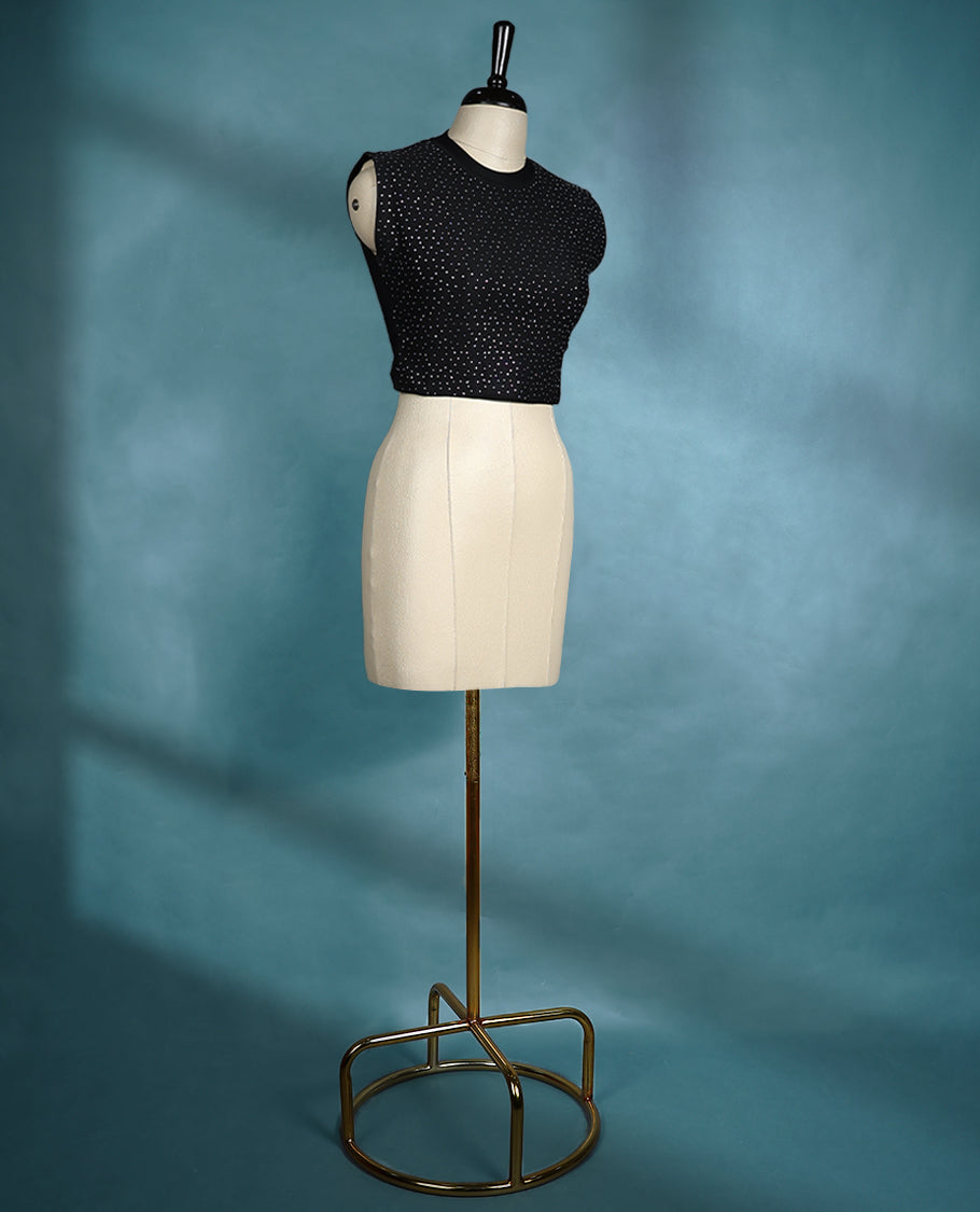 Black colour sleeveless crop top featuring a ribbed crew neck and all over stud embellishments, offering a chic and edgy look