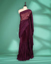 Deep Violet colour organza fancy saree adorned with intricate all over embroidery work in floral kodi patterns, finished with a matching floral embroidered border, with matching blouse