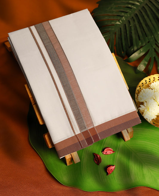 White Colour cotton single dhoti with 1.5 Inch Brown kara, crafted for traditional elegance & comfort, for men.