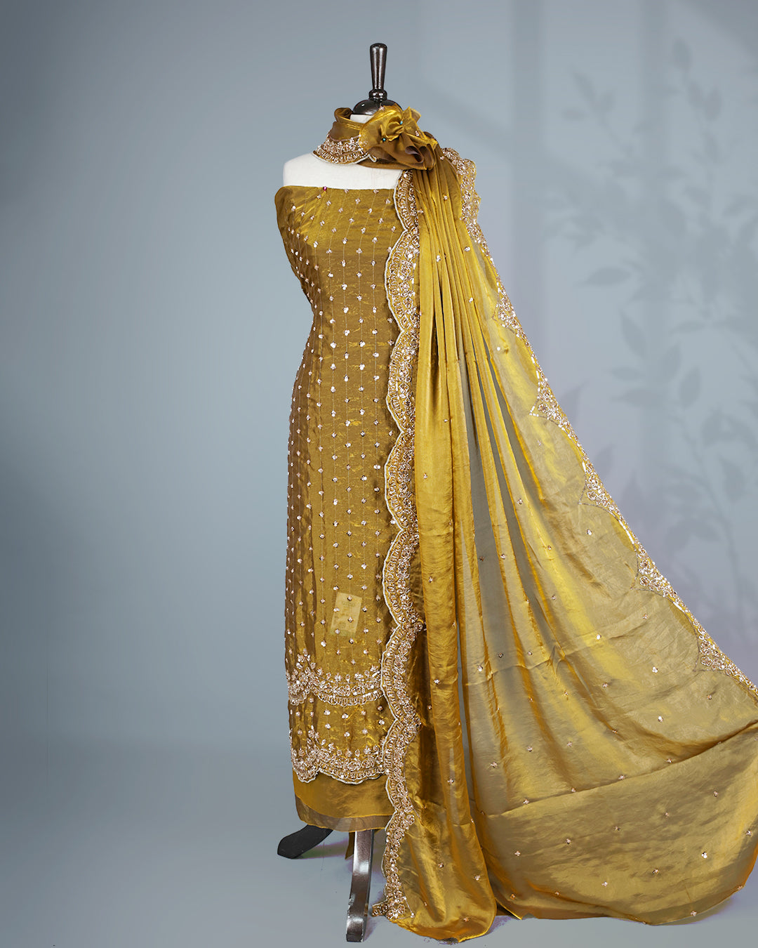 Olive colour salwar material with Cut beats & sequins work on body, Matching Bottom & dupatta.