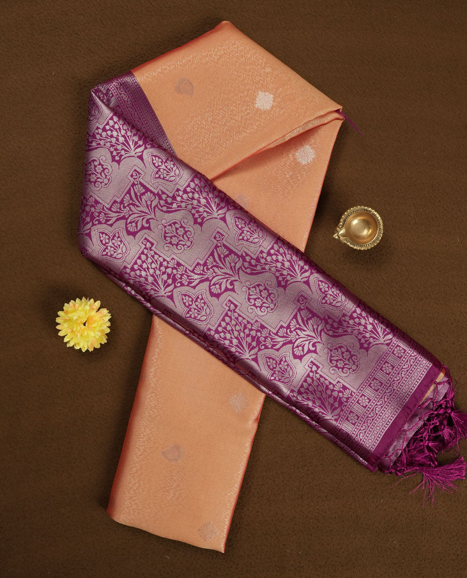 Peach colour Semi Silk Saree with Silver Zari Butta Motifs, Contrasting Magenta Zari Woven Pallu and Border Featuring Intricate Floral Patterns and Tassels, Paired with Coordinated Blouse Piece