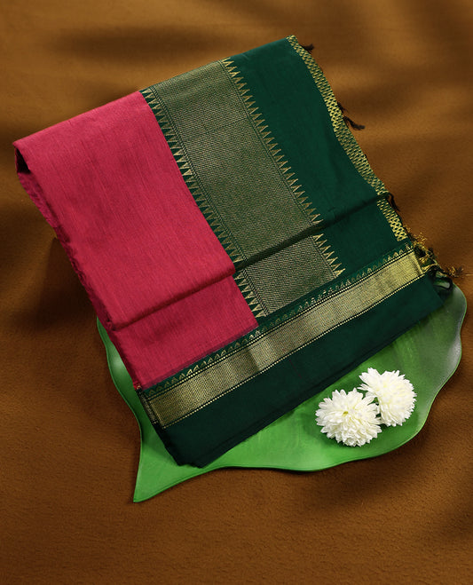 Hibiscus colour mixed Kalyani cotton saree featuring Plain body, paired with Deep Green colour traditional border and pallu, with matching blouse