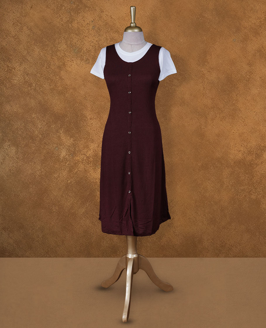 Wine maroon sleeveless A-line midi dress with front button detailing, layered over a white crew-neck short-sleeve inner tee
