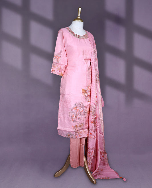 Pink colour salwar set with round neck and elbow sleeves featuring floral printed body and sleeve detail with embroidered neckline paired with matching plain bottom and floral printed dupatta