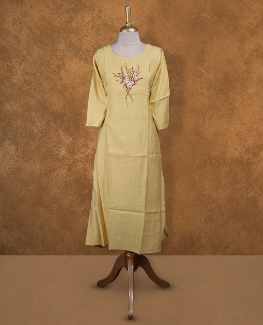 Yellow colour kurti with multicolour floral thread pattern, knee length design, styled with a round neckline and a  sleeve .