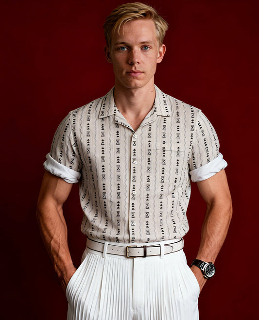 Off white colour shirt adorned with black geometric prints, Designed with a classic collar and short sleeves, it blends effortless style with everyday comfort.