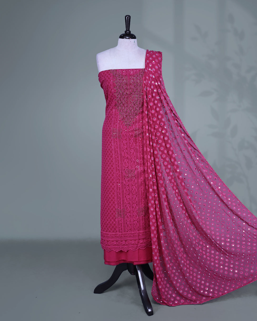 Magenta Colour Georgette Salwar Material featuring elegant Chikankari work on the kurta, paired with a matching bottom and a sequins-embellished dupatta.