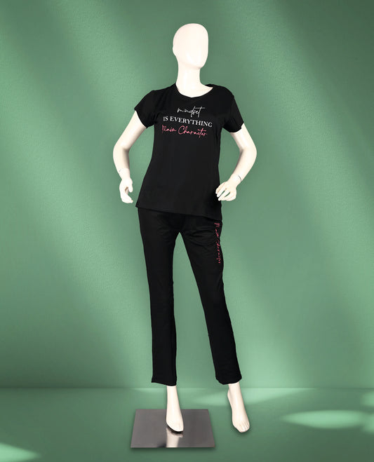 Black colour women's nightwear set featuring a round neck, short sleeves, and a motivational printed T-shirt paired with matching bottoms for comfort and style.
