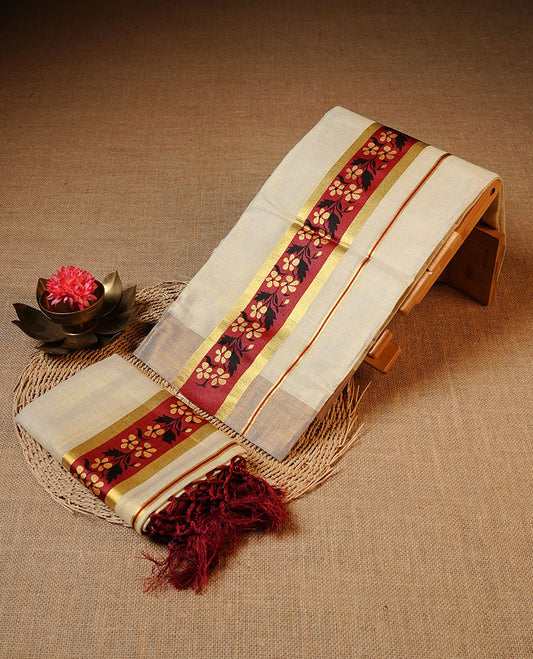 Golden colour Tissue silk set mundu features a plain body accented by a Floral print on gold zari border.