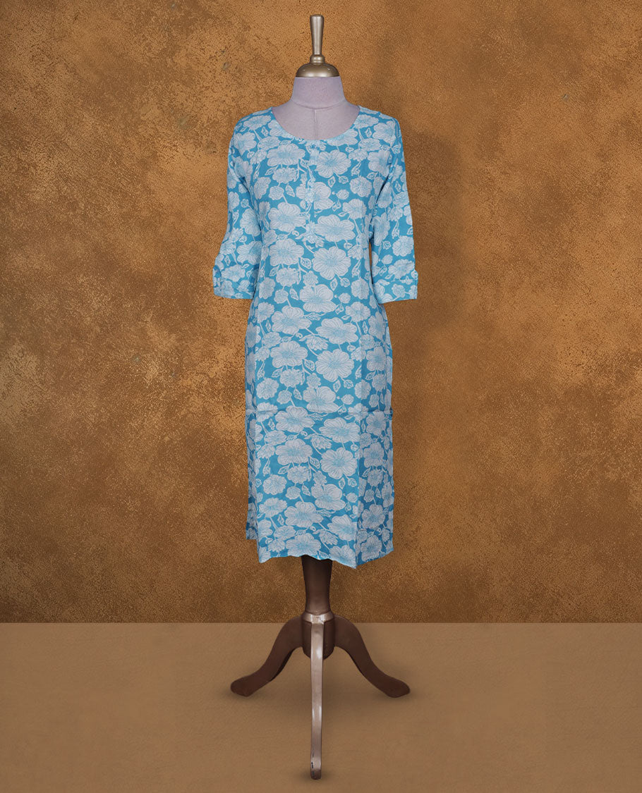 Sky and white colour kurti with White floral prints, knee length design, styled with a round neckline and a sleeve .