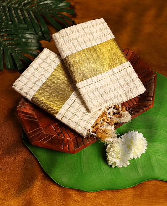 Off white colour cotton SET MUNDU featuring gold zari checked body, complemented by a bold gold toned border ( 2.00/2.80 MTS).
