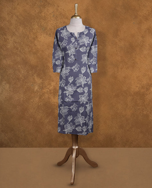 Blue Ash colour kurti adorned with white floral outlines and fine pinstripes, styled with a notched round neckline with button detailing and comfy 3/4th sleeves.