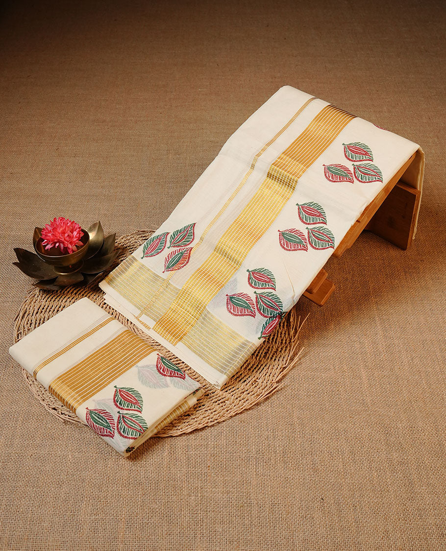 Off white colour Cotton Set Mund featuring a plain body, enhanced by a gold zari border with multicolour leaf printed motifs.