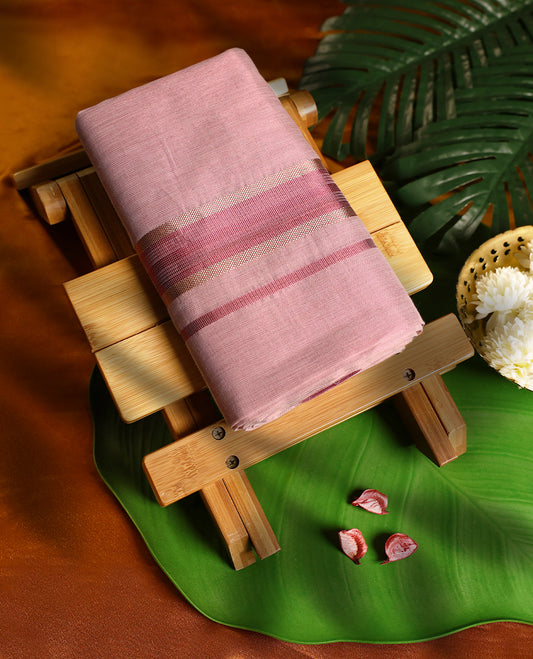 Soft pink colour pure handloom double dhoti featuring a maroon kara with subtle golden zari weaving, crafted with fine traditional detailing for elegance, comfort, and cultural occasions.
