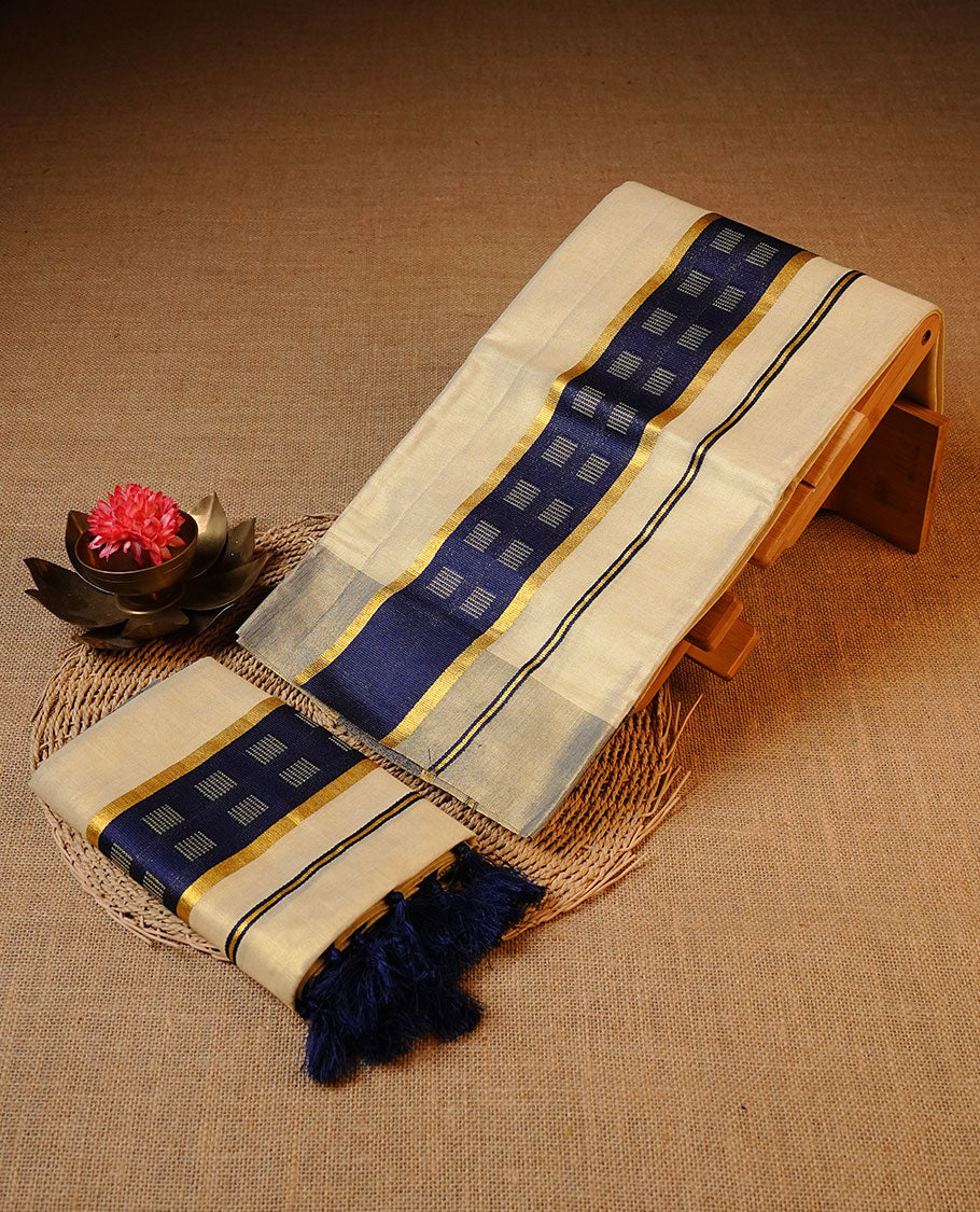 Cream colour Tissue silk set mund Featuring Elegant plain body, Complemented by  gold zari on blue colour border.