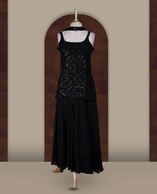 Vibrant Black colour sharara set featuring a sleeveless sequin embellished top with delicate beadwork, paired with a flowy flared bottom and dupatta for a contemporary festive look.