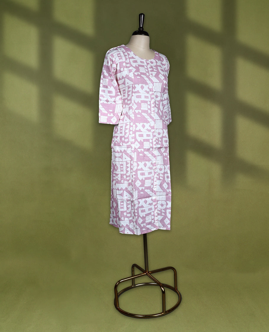 Soft mauve and white printed kurti with abstract geometric patterns, styled with a round neckline, front button placket, and 3/4th sleeves, ideal for smart casual or daily wear.
