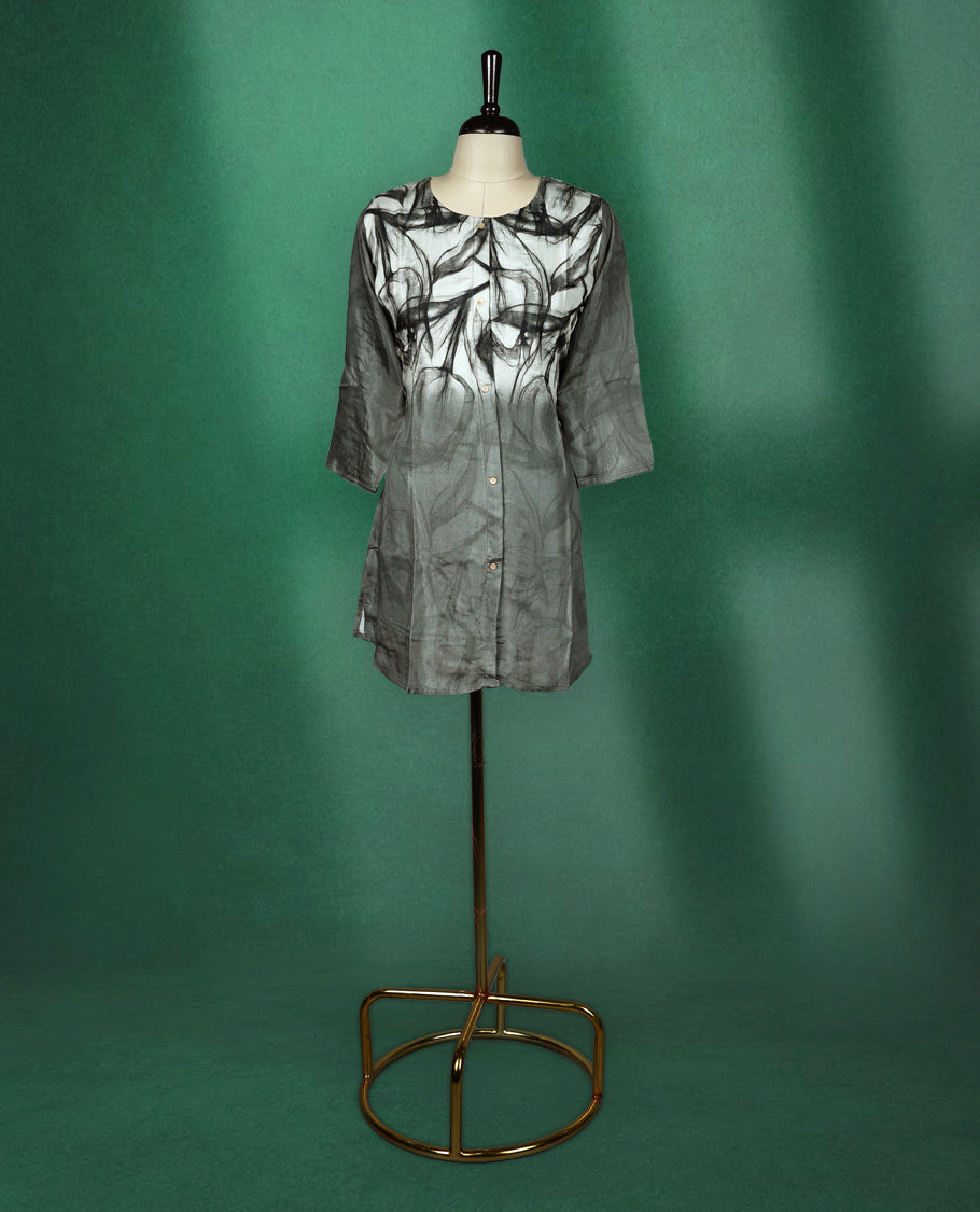 Stylish black and grey short kurti featuring a smoky abstract print, button down front, round neckline, and 3/4th sleeves perfect for a chic casual look.